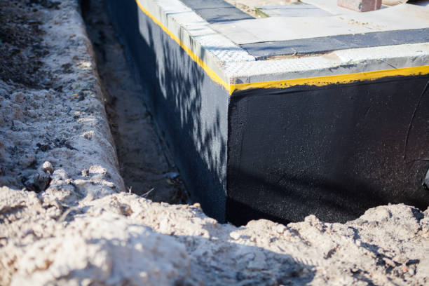 Professional Waterproofing technician working in La Follette, TN